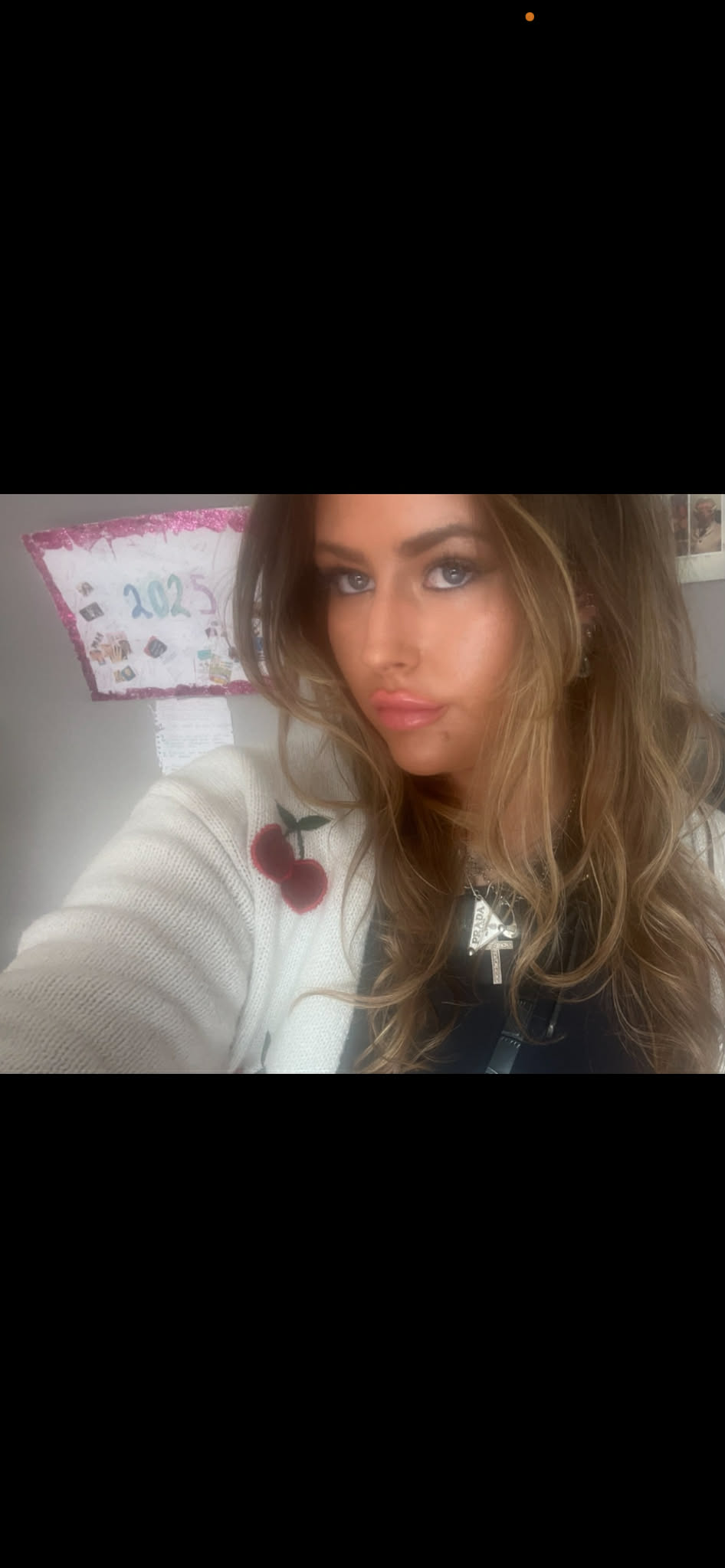 Portrait of Chloe Bates smiling — a friendly photo for families, teachers, and young people visiting the site.